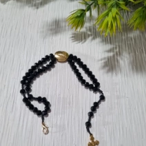 Pulseira terço preta e dourada Nossa Senhora Aparecida