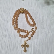Pulseira terço salmão e dourada Espírito Santo