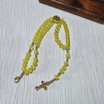 Pulseira terço amarela clara e dourada São Bento